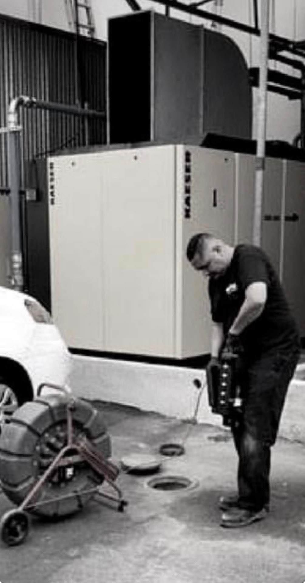JPro4 technician performing a sewer camera inspection on a commercial drain line